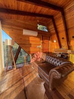 Deluxe Cabin, 1 Queen Bed, Mountain View | Living area | 40-inch Smart TV with digital channels, TV, Netflix