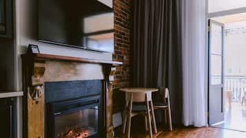 Honeymoon Room, 1 King Bed with Sofa bed, Balcony | Living area | 40-inch Smart TV with digital channels, TV, Netflix