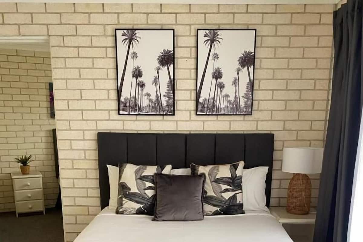 Habitación superior, 2 habitaciones, vista parcial al océano | 1 habitación, wifi gratis y ropa de cama