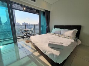Apartment, 2 Bedrooms, City View | Desk, laptop workspace, soundproofing, iron/ironing board - Summer Suites KLCC (Kuala Lumpur)
