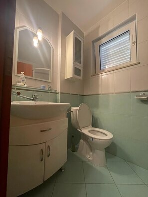 Apartment, 2 Queen Beds | Bathroom | Shower, bidet, towels, soap