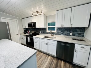 Fridge, microwave, oven, stovetop - Walk to Historical Canal Street - 5 Minute Ride To The Beach! (New Smyrna Beach)