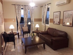 Departamento, varias camas | Sala de estar