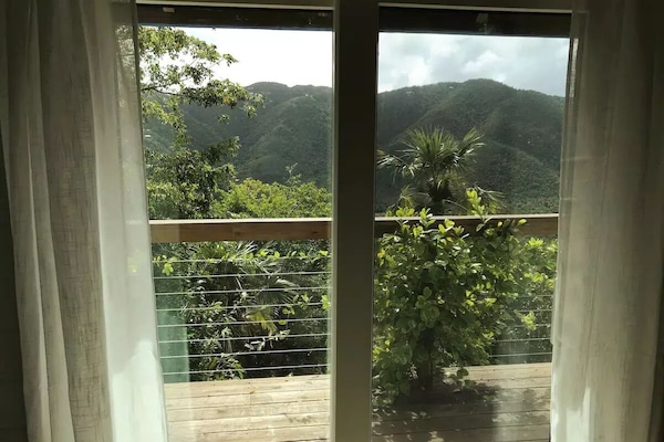 View of the mountains from your bed!