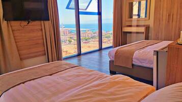 Classic Triple Room | Beach/ocean view