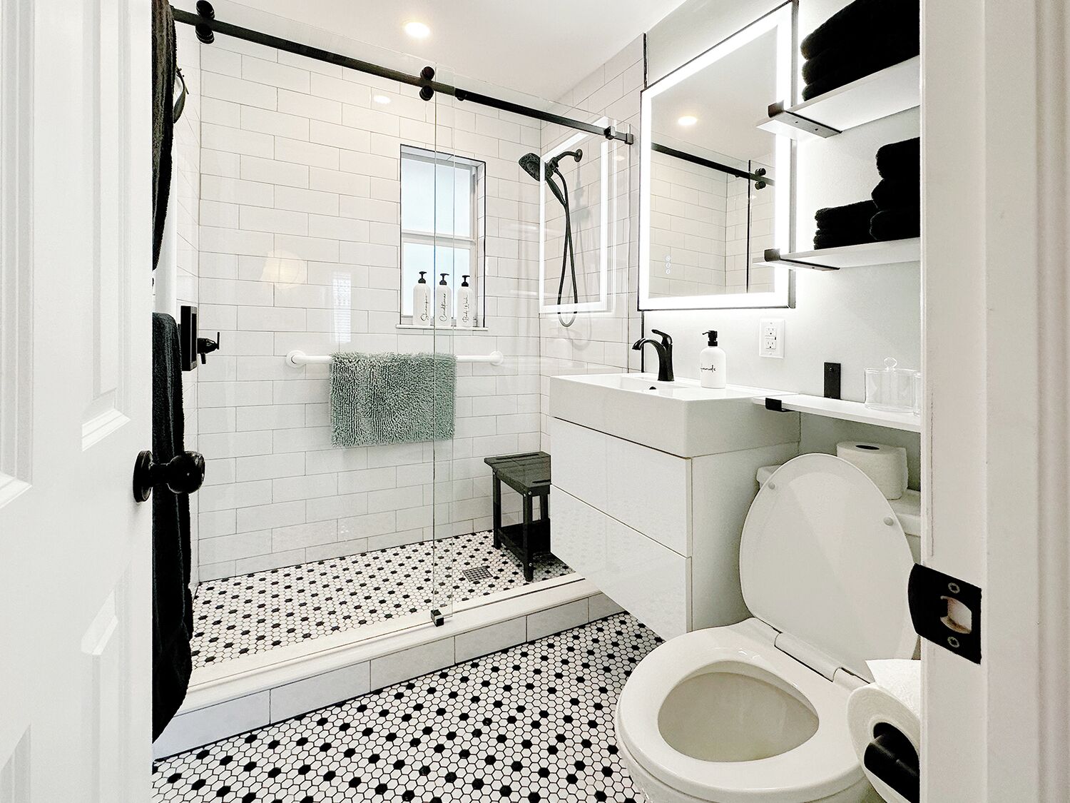 Combined shower/tub, hair dryer, towels, soap