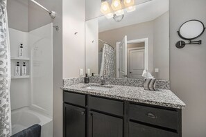 Combined shower/tub, hair dryer, bidet, towels
