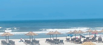 Beachfront apartment with terraces. 