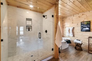 Bathtub, jetted tub, hair dryer, towels