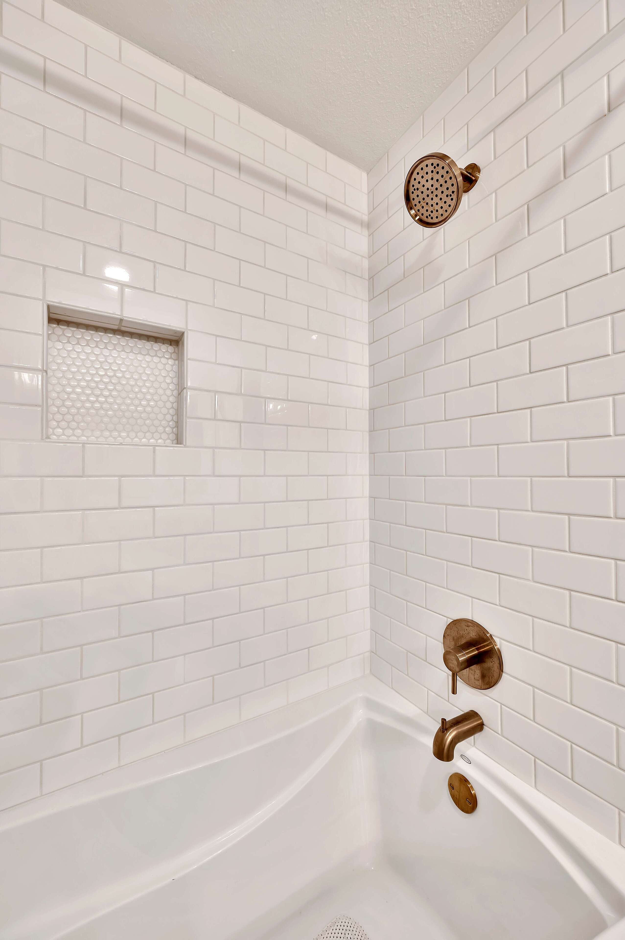Combined shower/tub, hair dryer, towels, soap