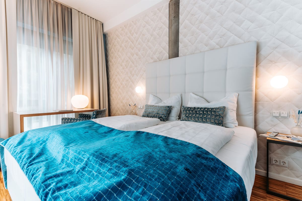 Superior tweepersoonskamer | Hypoallergeen beddengoed, een kluis op de kamer, individueel gedecoreerd