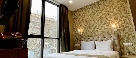 Habitación doble clásica | Ropa de cama hipoalergénica, camas con pillow-top y minibar