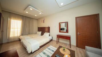 Family Apartment | In-room safe, blackout drapes, iron/ironing board, free WiFi