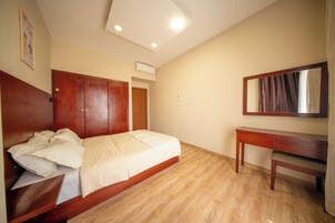 Family Apartment | In-room safe, blackout drapes, iron/ironing board, free WiFi