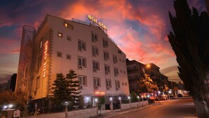 A hotel named 'elit otel' with a modern design, multiple floors, and a prominent balcony area. - Elit Otel (Antalya)