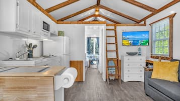 Bungalow Familial | Coin séjour | TV connectée