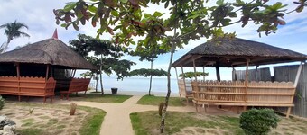 Takbo Beach Resort - Cabana #3 - Two Queen Beds and amenities