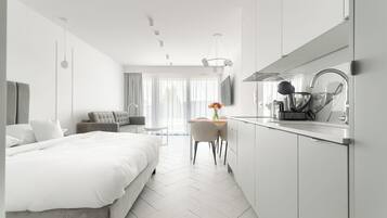 Studio Deluxe | Coin séjour | Télévision à écran plat