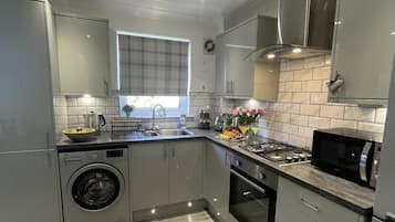 House | Private kitchen | Microwave, stovetop, electric kettle, toaster