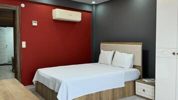 Familienapartment, 1 Schlafzimmer, Stadtblick | 1 Schlafzimmer, hochwertige Bettwaren, Daunenbettdecken