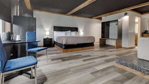 A modern bedroom with a bed, a desk, and a chair. - Hotel Lex and Conference Center, Trademark Collection (Lexington)