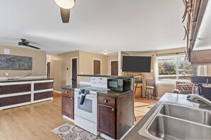 Fridge, microwave, oven, stovetop - Family Beach Retreat; Hot Tub, Private Yard and Game Room (Kings Grant)