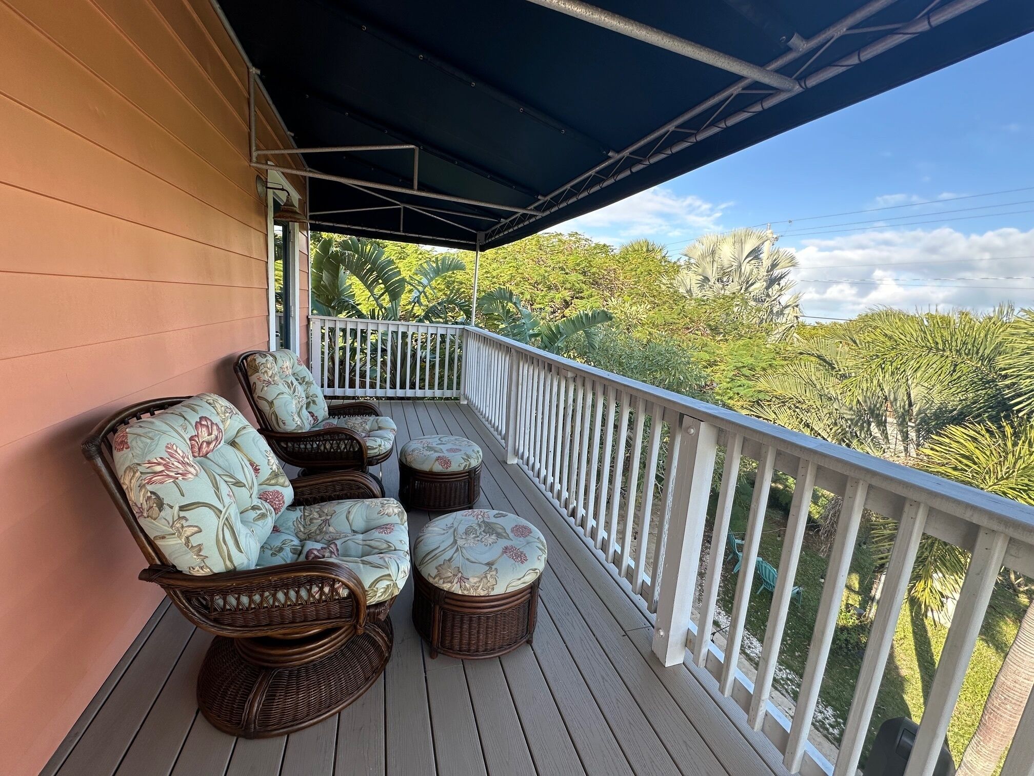 room #5, upstairs suite, 1 king bed and 2 twin trundle beds, private balcony | terrace/patio