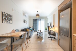 City Double Room | Living area | 43-inch Smart TV with digital channels, TV - Elegant Home with Balcony by CloudKeys (Athens)