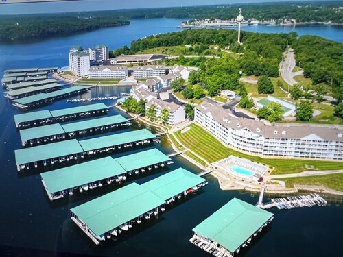 Beautiful lake front condo in perfect location by land and water.  Boat Slip.