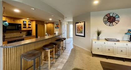 Beautiful lake front condo in perfect location by land and water. Boat Slip.