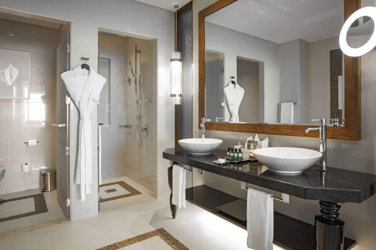 Designer toiletries, hair dryer, bathrobes, slippers