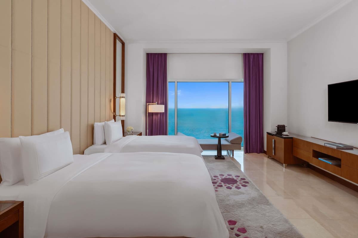 Deluxe Suite, 2 Bedrooms | Premium bedding, minibar, in-room safe, individually furnished