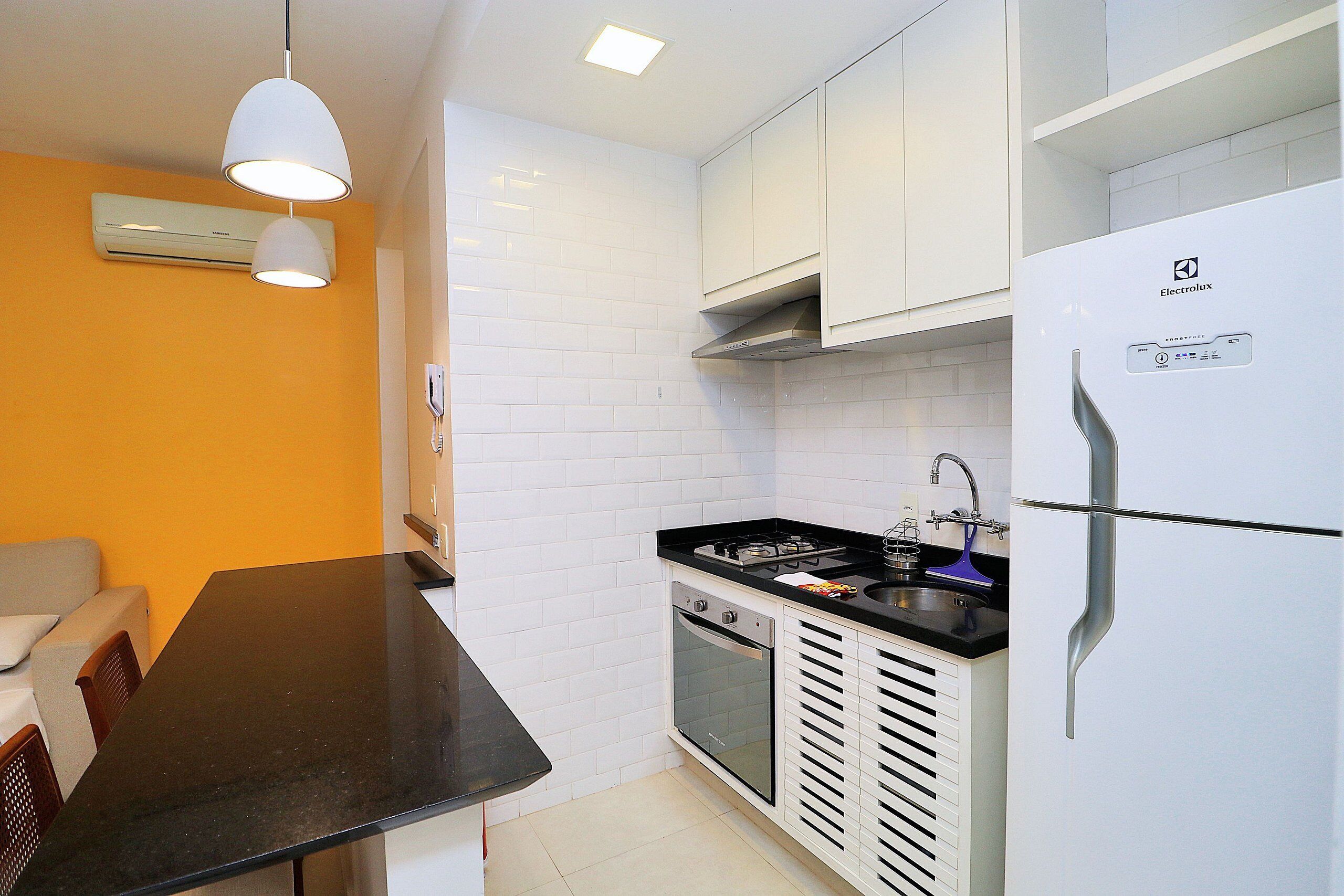 Executive Quadruple Room | Private kitchen | Fridge, oven, stovetop, coffee/tea maker