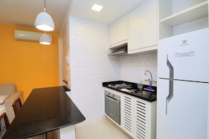 Habitació quàdruple executiva | Cuina privada | Frigorífic, forn, placa de cuina i cafetera i tetera