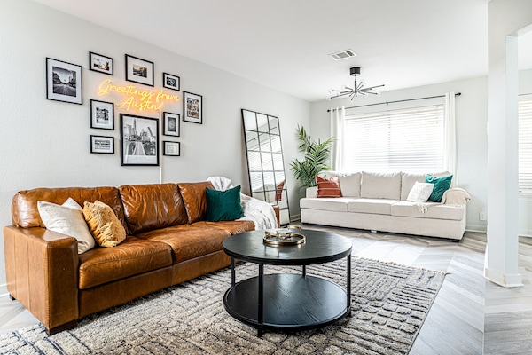 Living room with plenty of seating and sofa bed.