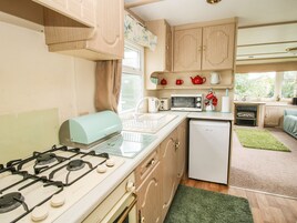 Fridge, electric kettle, toaster, cookware/dishes/utensils