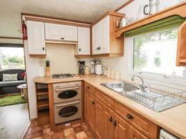 Fridge, electric kettle, toaster, cookware/dishes/utensils