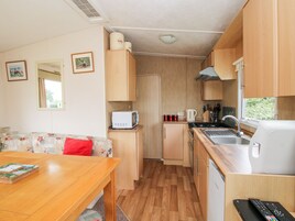 Fridge, electric kettle, toaster, cookware/dishes/utensils