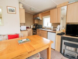 Fridge, electric kettle, toaster, cookware/dishes/utensils