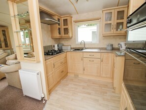 Fridge, electric kettle, toaster, cookware/dishes/utensils