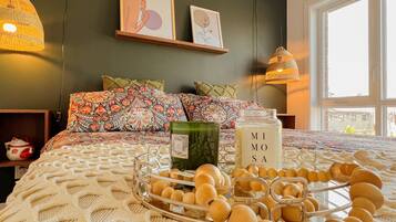 1 bedroom, desk, iron/ironing board, travel crib