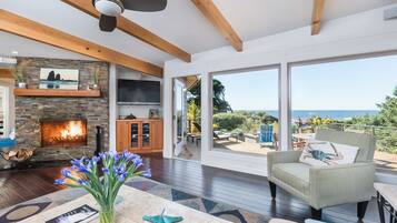 55-inch TV with digital channels, fireplace, streaming services