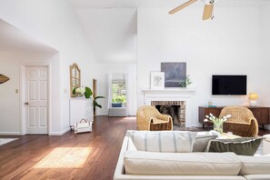 55-inch TV with digital channels, fireplace, streaming services - Wisteria by Avantstay Bright & Spacious Home w/ Pool & Entertainers Patio! (Hilton Head Island)