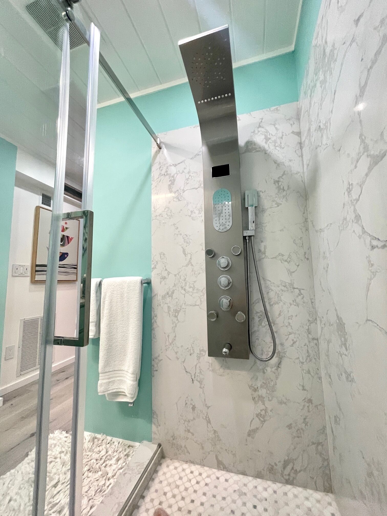 Shower, eco-friendly toiletries, hair dryer, towels