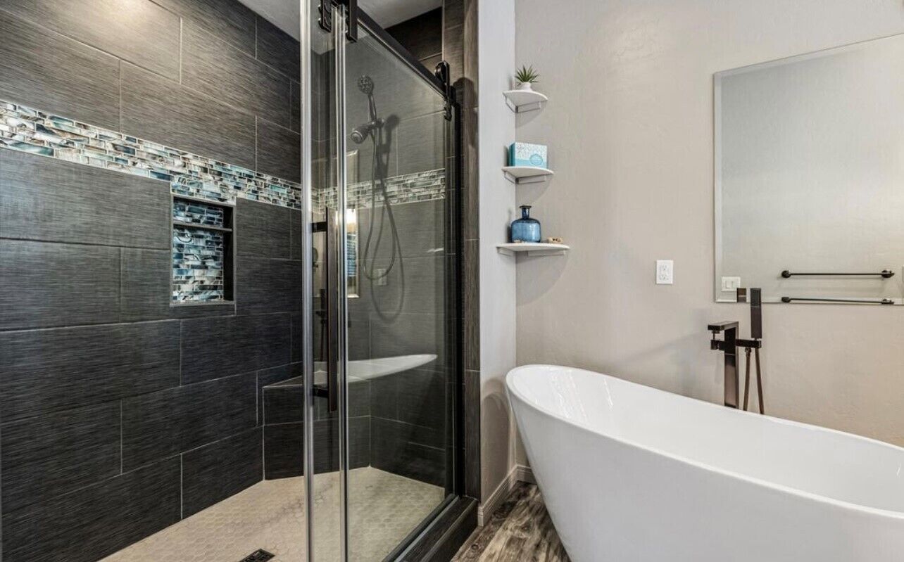 Bathtub, hair dryer, towels, soap