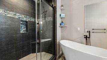 Bathtub, hair dryer, towels, soap