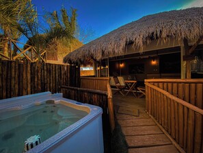 Deluxe Cabin, Fireplace, Garden View | Premium bedding, down duvets, pillow-top beds, minibar - Palm Valley Cabins (Mazatlán)