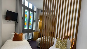 Family Quadruple Room | Iron/ironing board, WiFi (free), bed sheets - The Assembly Place, A Co-Living Hotel At Mayo (Singapore)