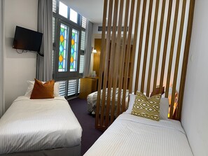 Family Quadruple Room | Iron/ironing board, free WiFi, bed sheets - The Assembly Place, A Co-Living Hotel At Mayo (Singapore)