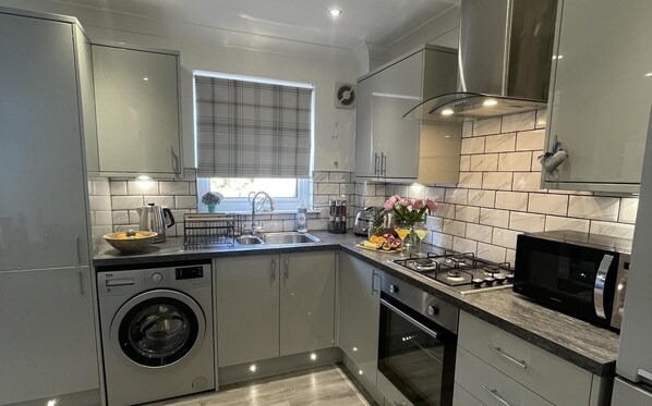 Microwave, stovetop, coffee/tea maker, toaster